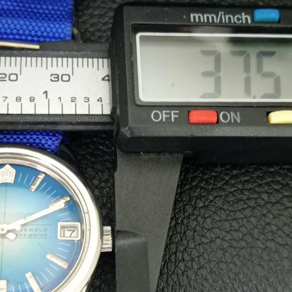 Vintage 1980 Citizen Manual Mens Silver Watch W/daydate & Blue accents